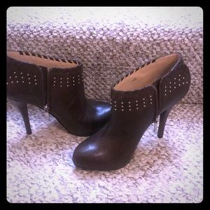 Brown high heeled low cut boots